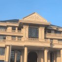 河池黄金麻别墅外墙干挂石材效果示例