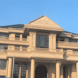 河池黄金麻别墅外墙干挂石材效果示例