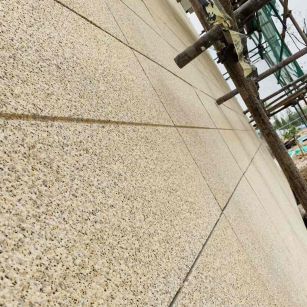 河池 黄金麻花岗岩荔枝面外墙干挂石材效果示例