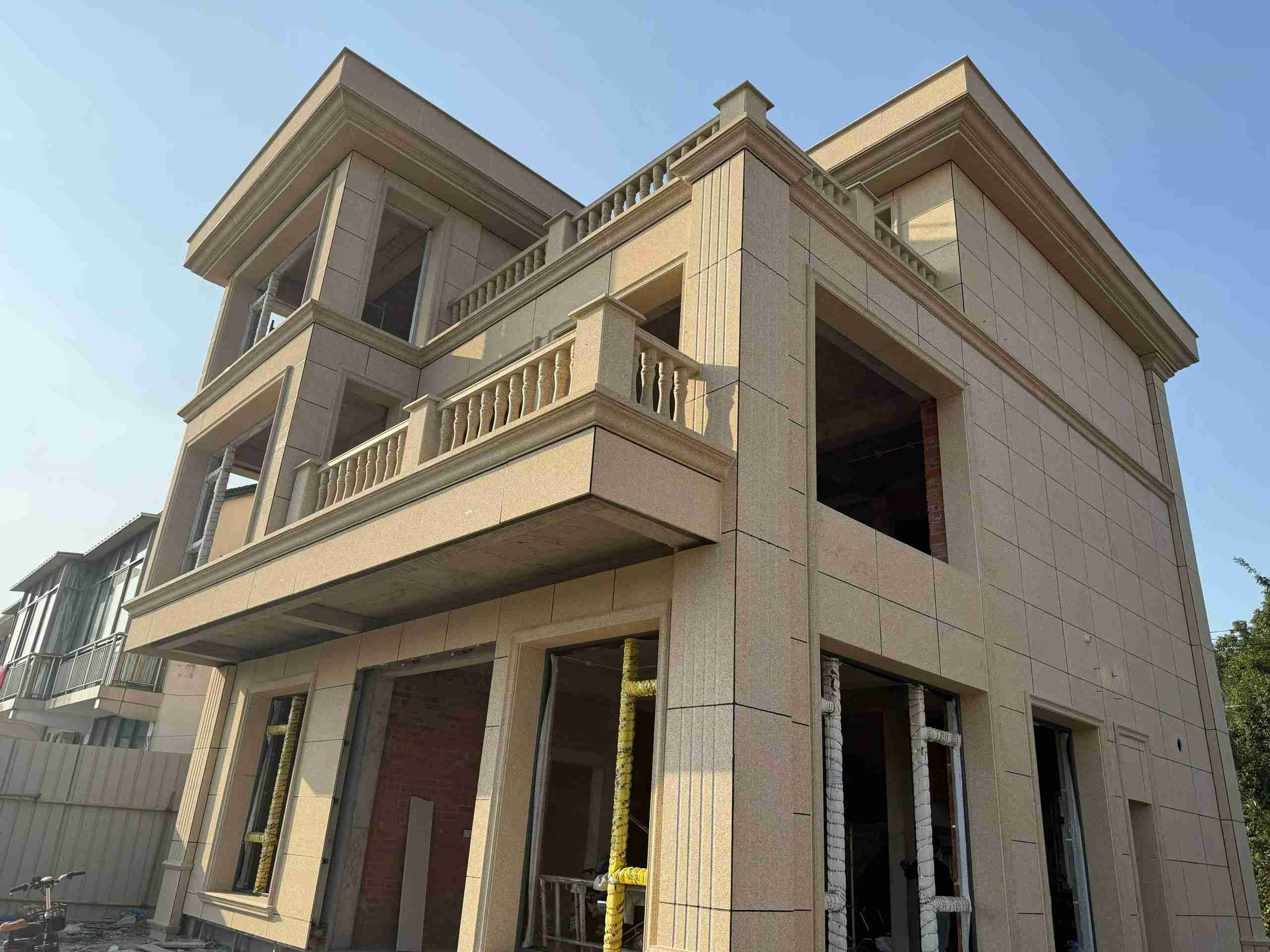 河池 黄金麻花岗岩石材荔枝面外墙干挂效果展示